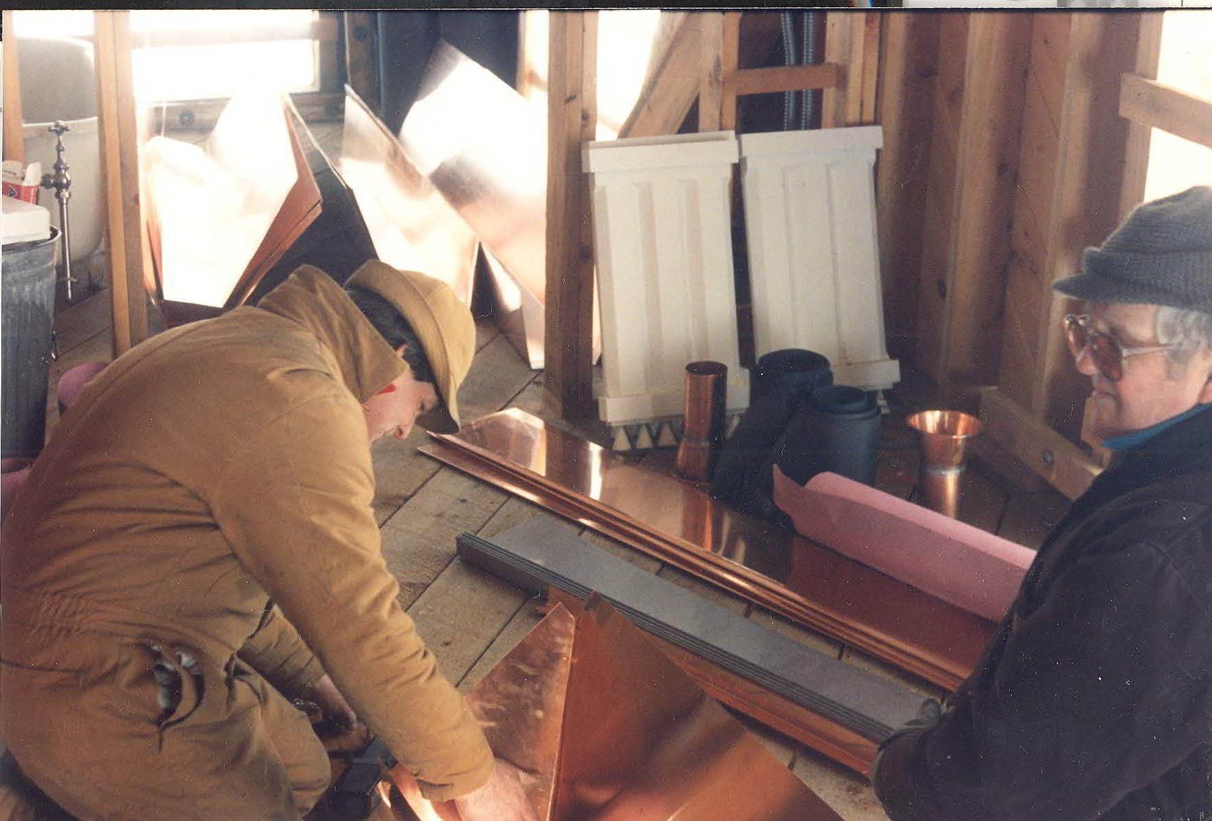 Danny, Charlie, and Joyce on the copper roof